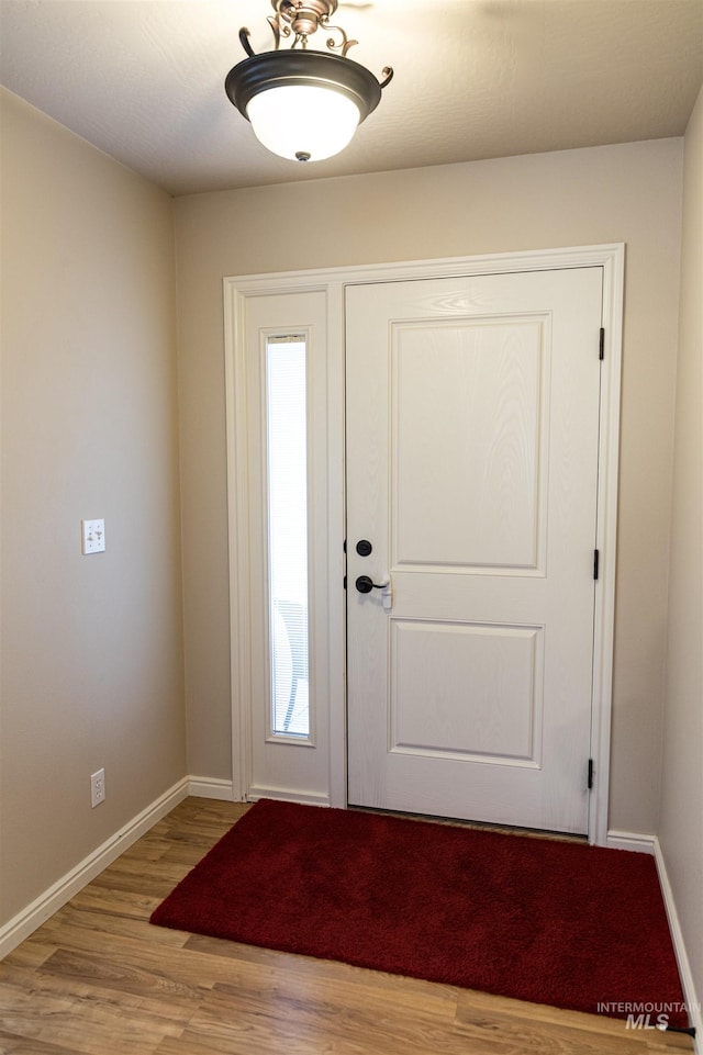 entrance foyer featuring light wood-type flooring