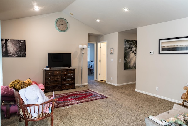 carpeted living room featuring lofted ceiling