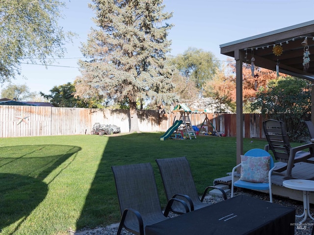 view of yard with a playground