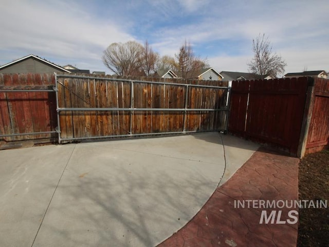 view of patio featuring fence