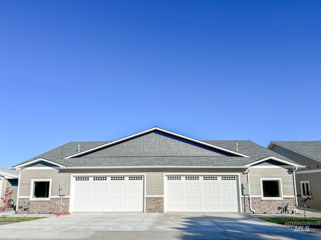 craftsman inspired home featuring a garage