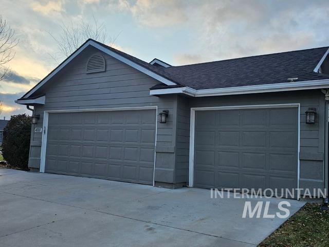 exterior space with a garage