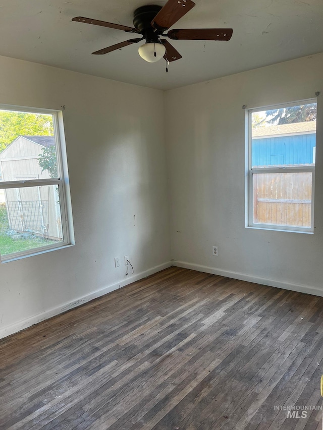 1224 Colorado, Gooding, ID 83330 - empty room featuring dark wood-style flooring, ceiling fan, and baseboards