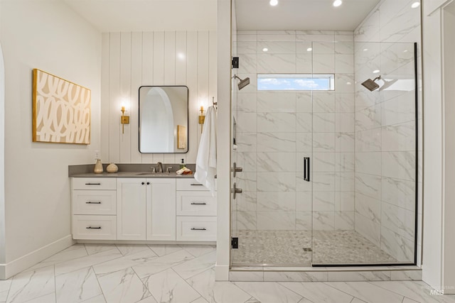 bathroom with vanity, baseboards, recessed lighting, a shower stall, and marble finish floor