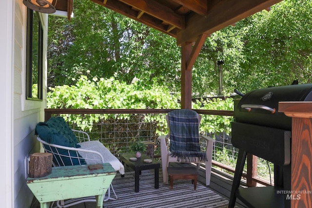 wooden terrace with grilling area