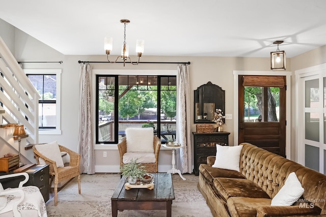 living area with a notable chandelier