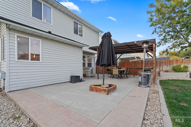 view of patio / terrace with outdoor dining area and fence