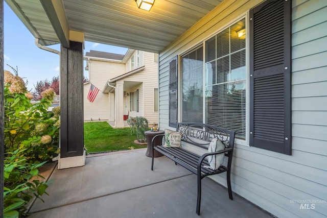 view of patio featuring a porch