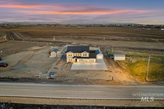 aerial view at dusk with a rural view