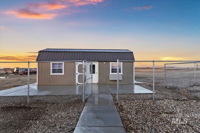 outdoor structure at dusk with a water view