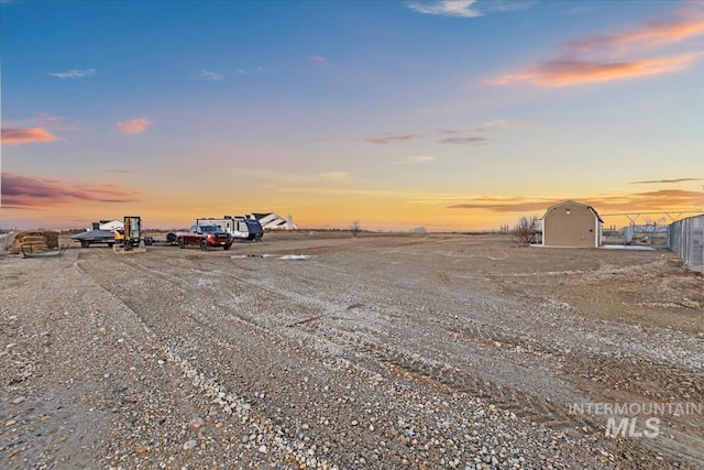 view of parking at dusk