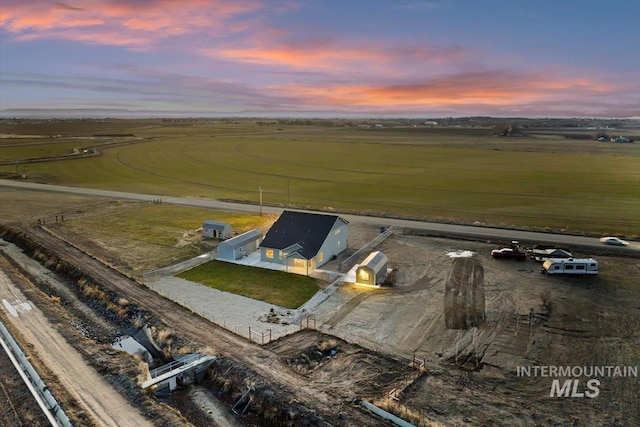 aerial view at dusk with a rural view