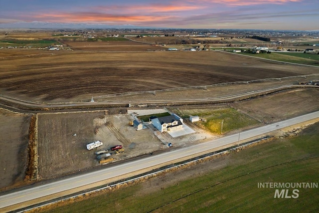 aerial view at dusk with a rural view