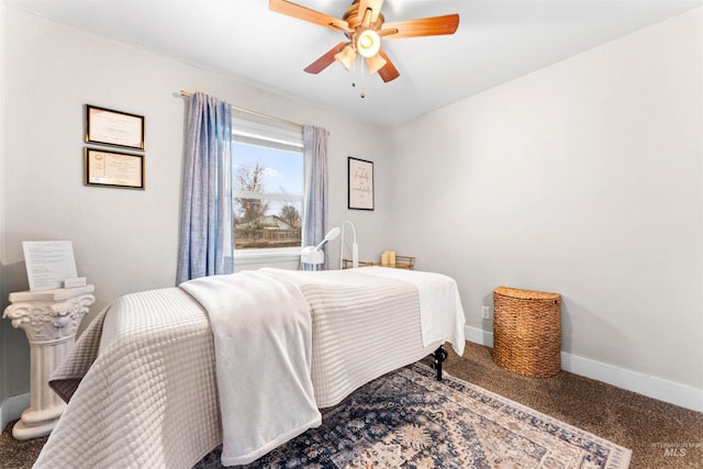 carpeted bedroom featuring a ceiling fan and baseboards