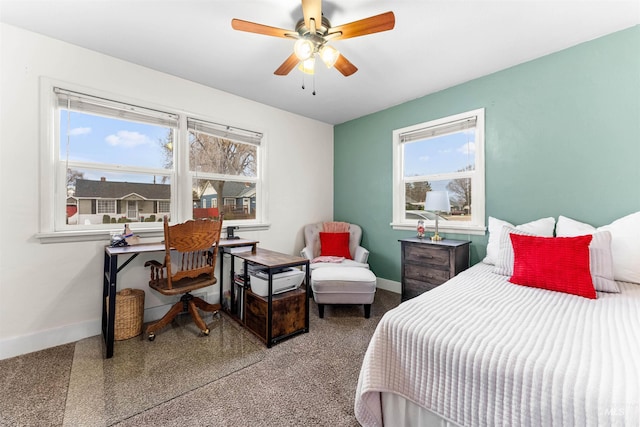 bedroom with baseboards and ceiling fan