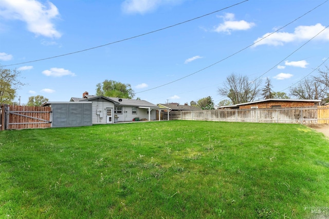 view of yard with a fenced backyard