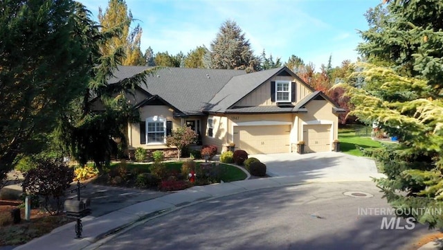 craftsman house featuring a garage