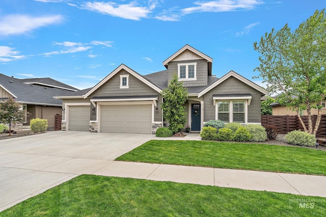 6922 N Agrarian, Meridian, ID 83646 - craftsman-style home with an attached garage, driveway, and stone siding