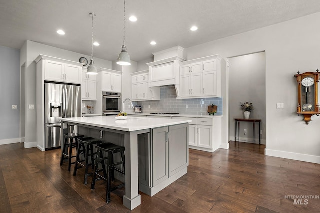 6922 N Agrarian, Meridian, ID 83646 - kitchen with stainless steel refrigerator with ice dispenser, baseboards, backsplash, a center island, and recessed lighting