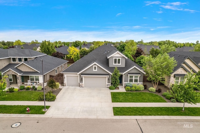 6922 N Agrarian, Meridian, ID 83646 - craftsman-style house with an attached garage, stone siding, a residential view, and concrete driveway