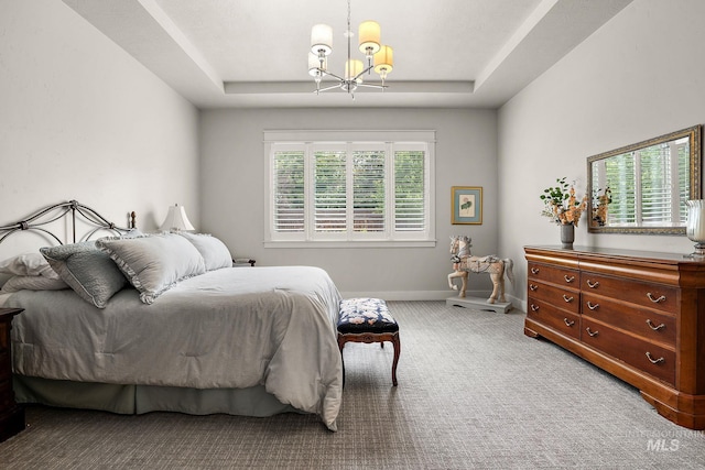 6922 N Agrarian, Meridian, ID 83646 - bedroom featuring a chandelier, a tray ceiling, baseboards, and carpet flooring