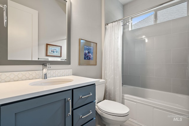 6922 N Agrarian, Meridian, ID 83646 - full bathroom with vanity, toilet, shower / tub combo with curtain, and backsplash