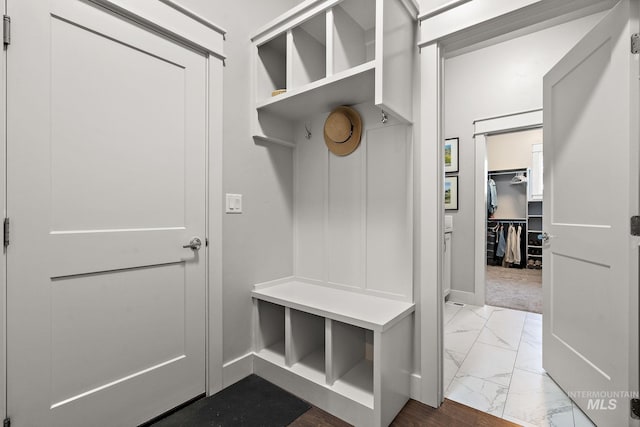 6922 N Agrarian, Meridian, ID 83646 - mudroom with marble look tile flooring and baseboards