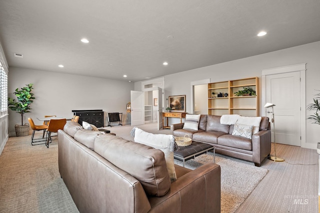 6922 N Agrarian, Meridian, ID 83646 - living room with recessed lighting, light carpet, and baseboards