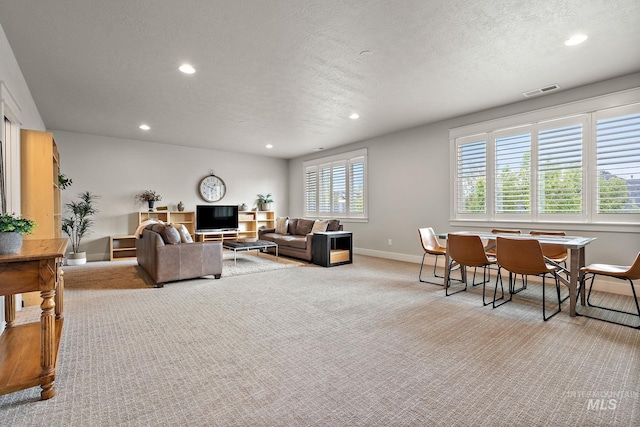 6922 N Agrarian, Meridian, ID 83646 - carpeted living room with recessed lighting, baseboards, and a textured ceiling