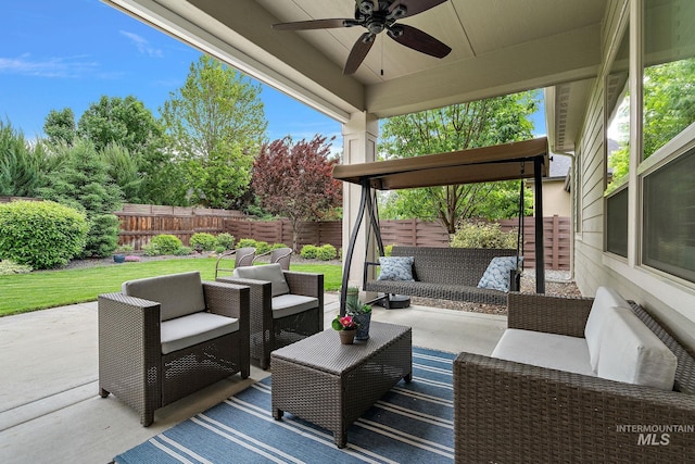 6922 N Agrarian, Meridian, ID 83646 - fenced backyard featuring an outdoor hangout area, ceiling fan, and a patio area