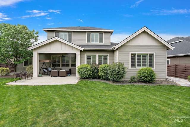 6922 N Agrarian, Meridian, ID 83646 - back of property with board and batten siding, a patio, an outdoor hangout area, and roof with shingles