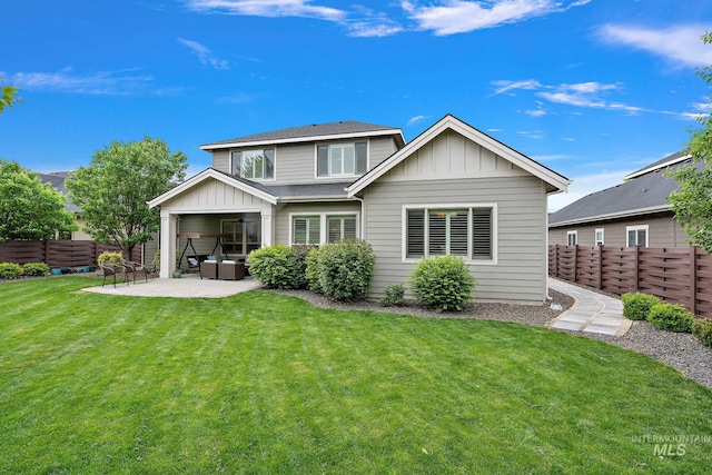 6922 N Agrarian, Meridian, ID 83646 - back of house with board and batten siding, a patio area, and an outdoor hangout area