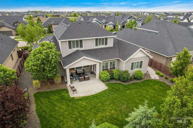 6922 N Agrarian, Meridian, ID 83646 - rear view of property with roof with shingles, a residential view, and a patio area