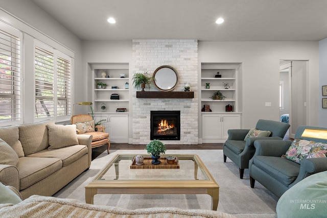 6922 N Agrarian, Meridian, ID 83646 - living room featuring a fireplace, recessed lighting, and built in shelves