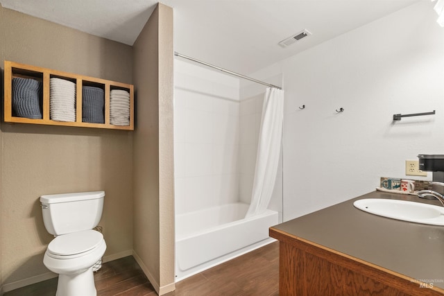 full bathroom with vanity, toilet, wood-type flooring, and shower / bathtub combination with curtain