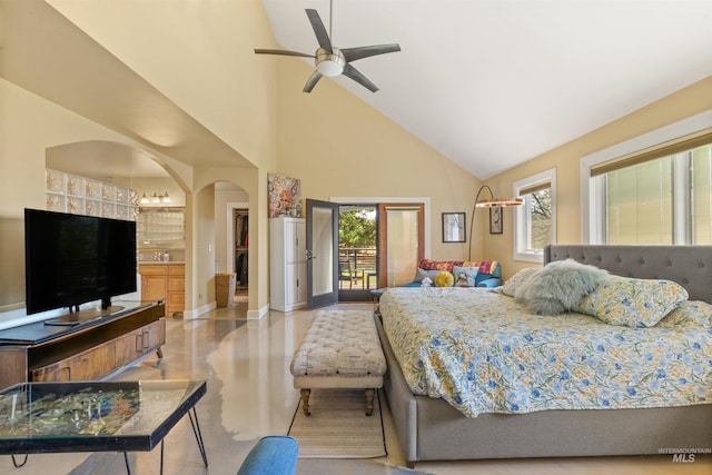 bedroom featuring access to exterior, ceiling fan, high vaulted ceiling, and connected bathroom