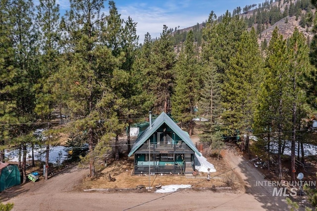 bird's eye view featuring a forest view