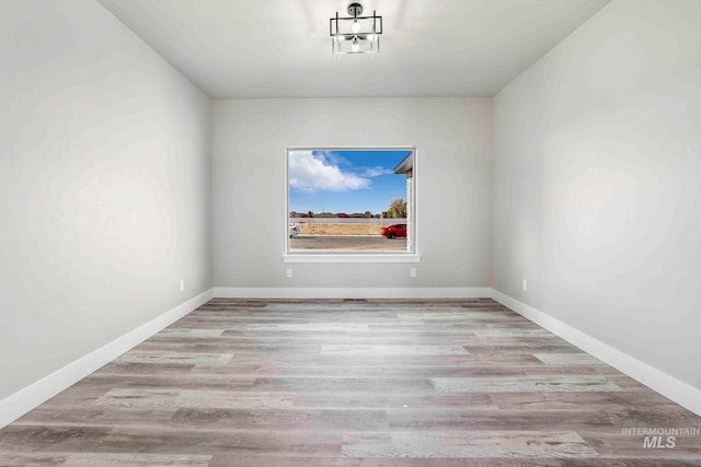 spare room with light wood-type flooring