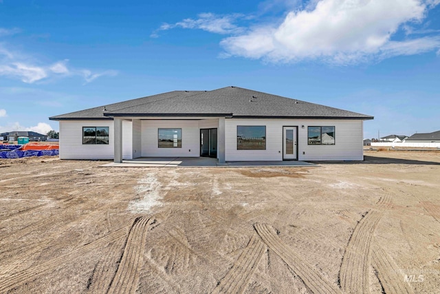 back of property featuring a patio area