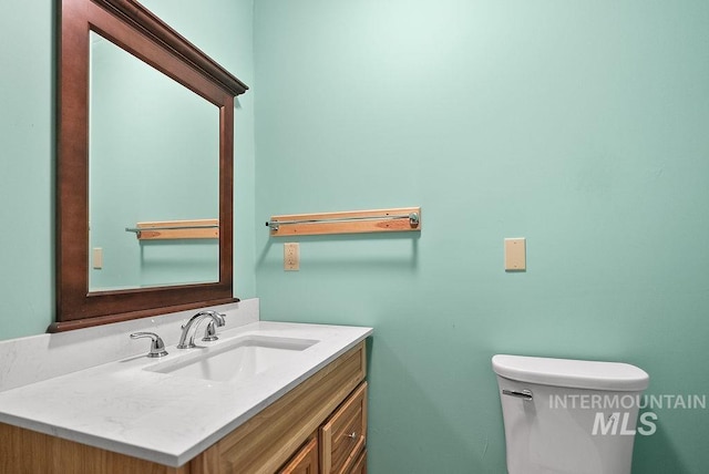 720 E Main St, Jerome, ID 83338 - bathroom featuring vanity and toilet