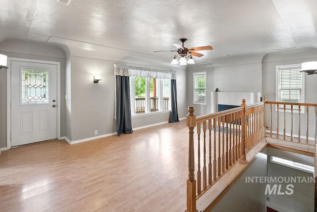 720 E Main St, Jerome, ID 83338 - foyer entrance featuring wood finished floors, baseboards, and a ceiling fan