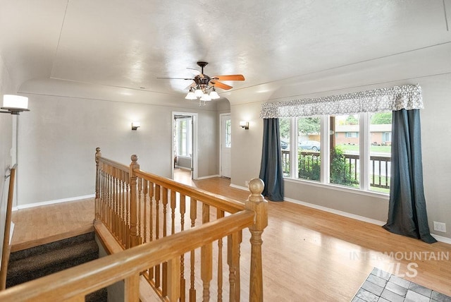 720 E Main St, Jerome, ID 83338 - corridor with an upstairs landing, baseboards, and light wood-type flooring