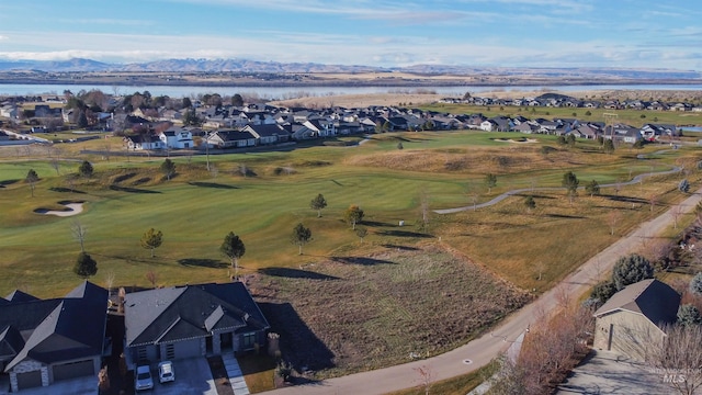 bird's eye view featuring a water and mountain view