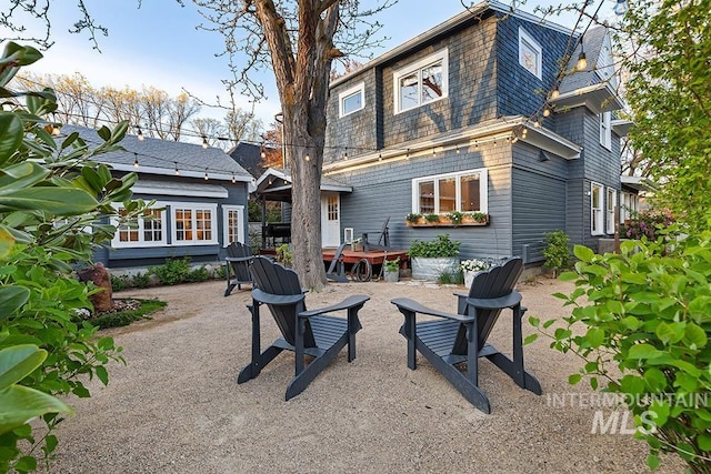 rear view of property with a patio