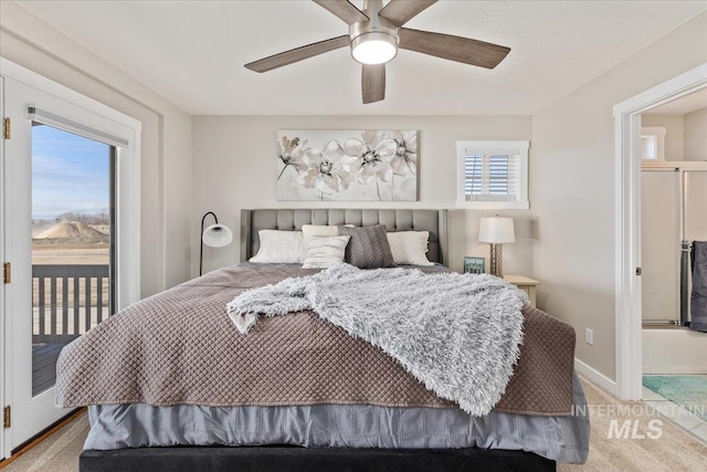bedroom featuring access to exterior, light colored carpet, a ceiling fan, and baseboards