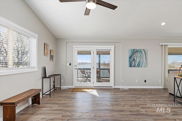 entryway featuring recessed lighting, baseboards, ceiling fan, and wood finished floors