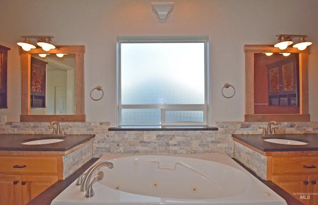 bathroom featuring vanity and a bathing tub