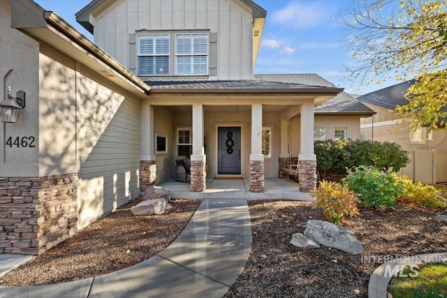 entrance to property with a porch