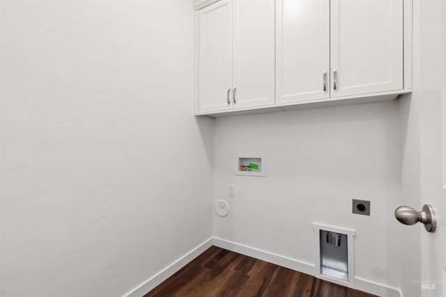 laundry room with electric dryer hookup, dark wood-type flooring, cabinet space, baseboards, and hookup for a washing machine