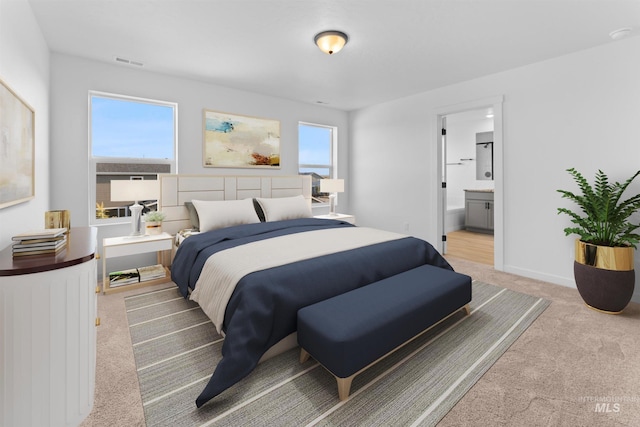 690 N Tessa Ave, Meridian, ID 83642 - bedroom with carpet, ensuite bath, and baseboards